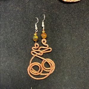 Handmade earrings made from natural materials.